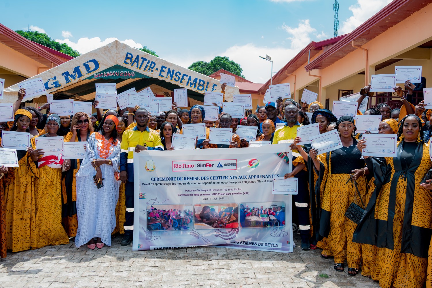 The 120 women and girls who graduated after a year-long training programme in Beyla