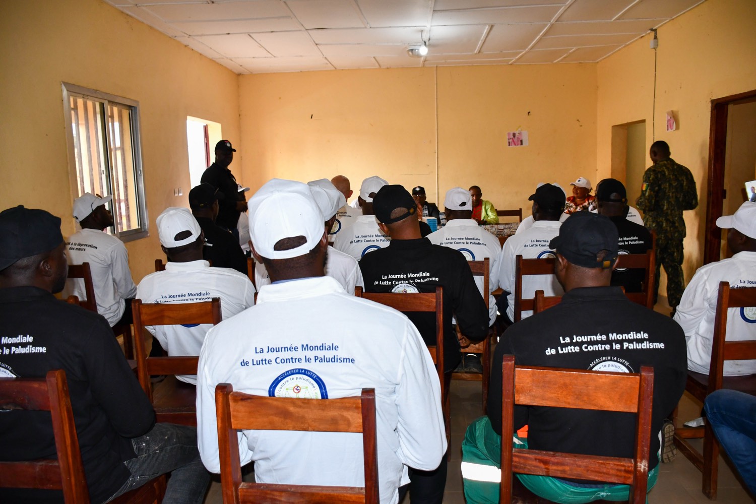 An awareness session for World Malaria Day in a community near the Simandou project.