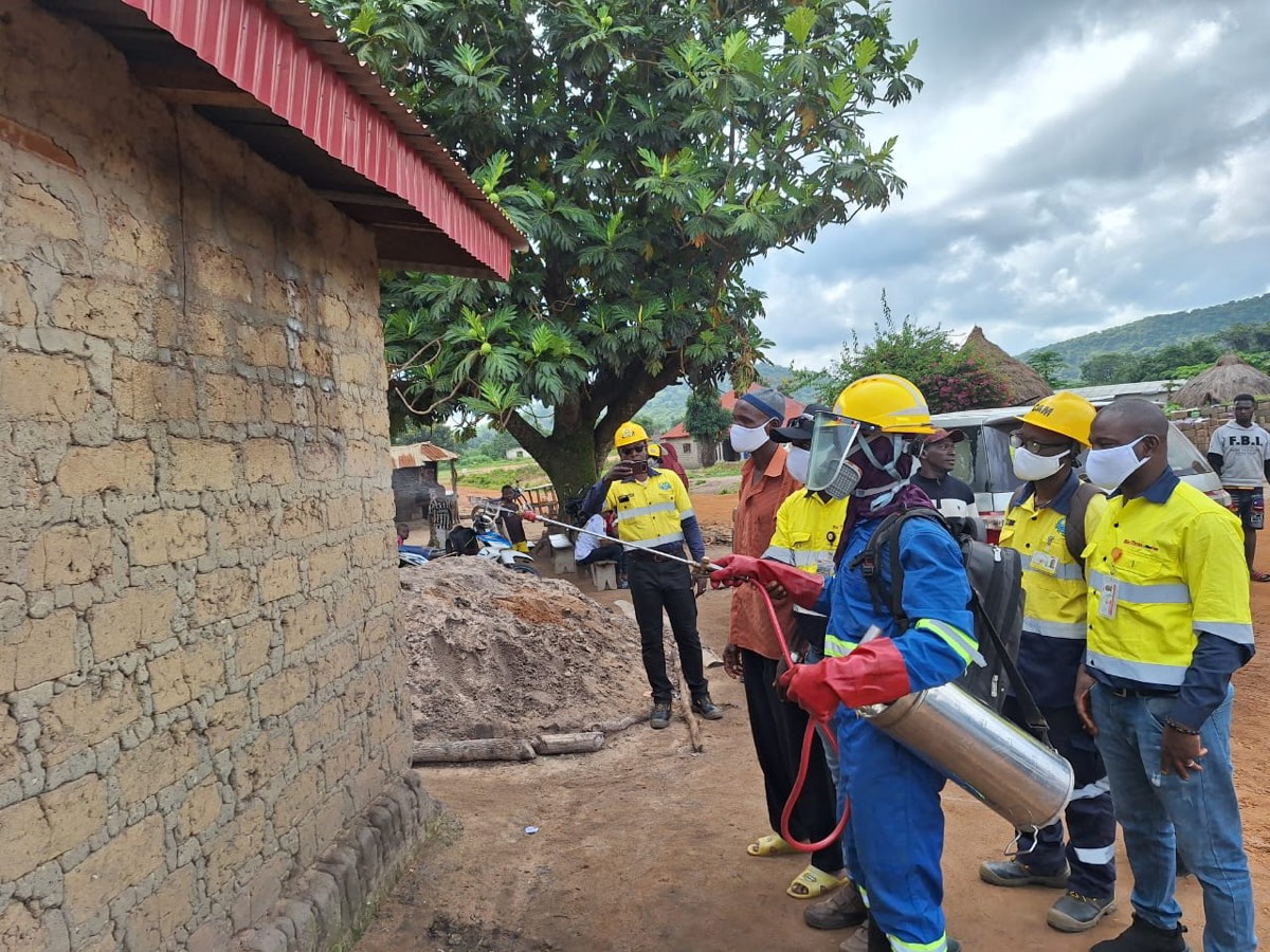 Community health workers carry out a home-based intervention in the fight against malaria.