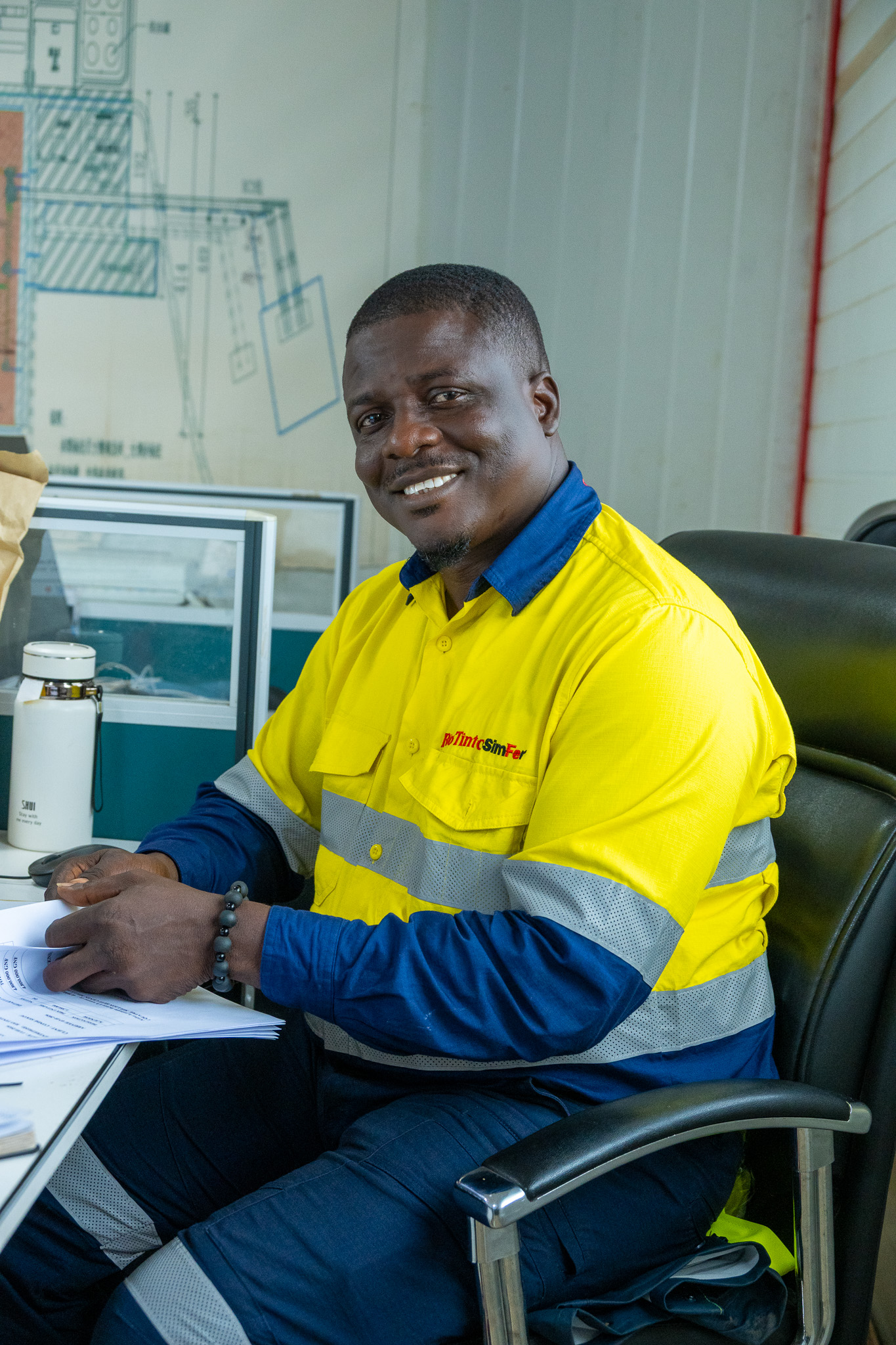 A Simandou team member at their workstation