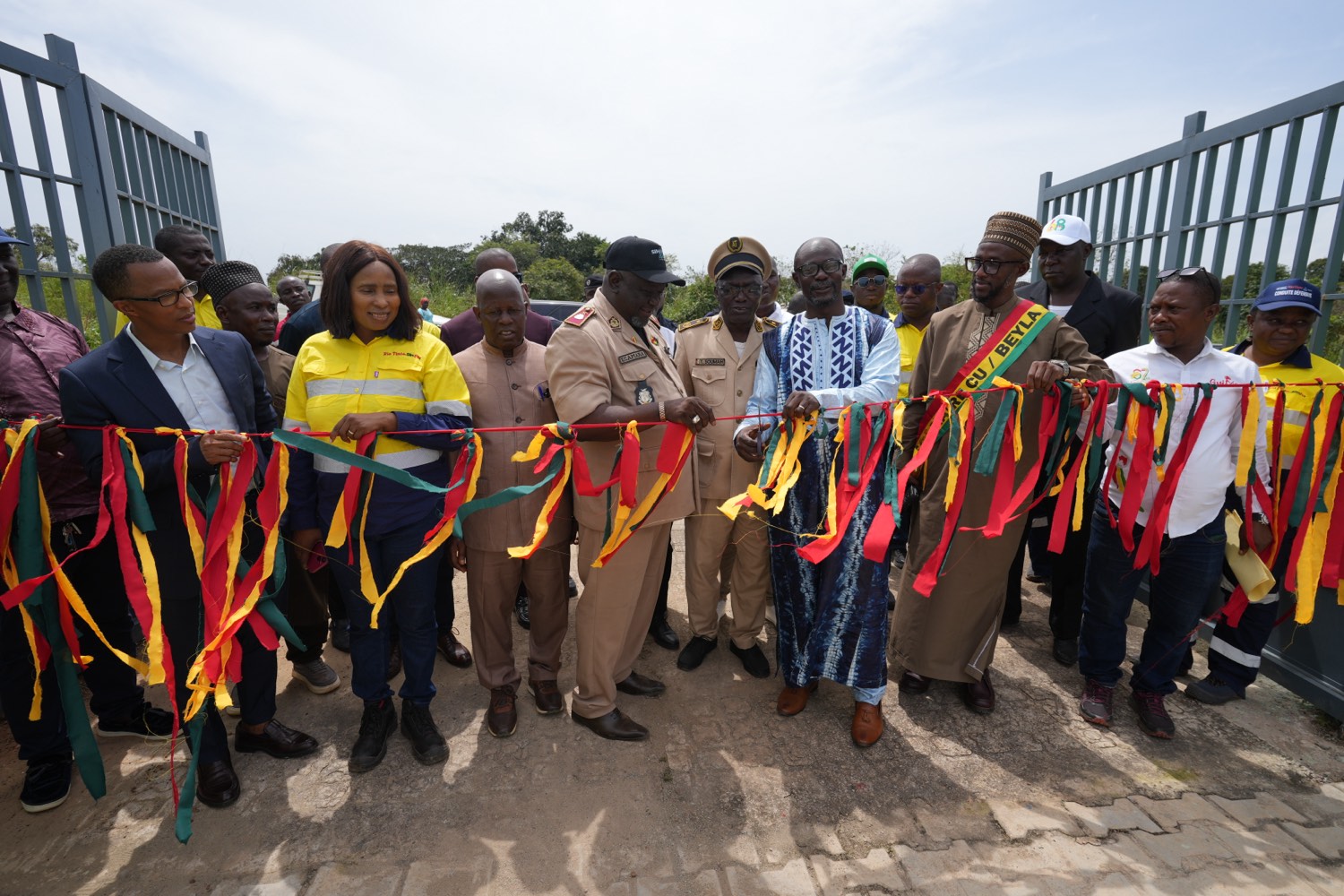 Local authorities and SimFer cut the ribbon at the official handover ceremony in Beyla